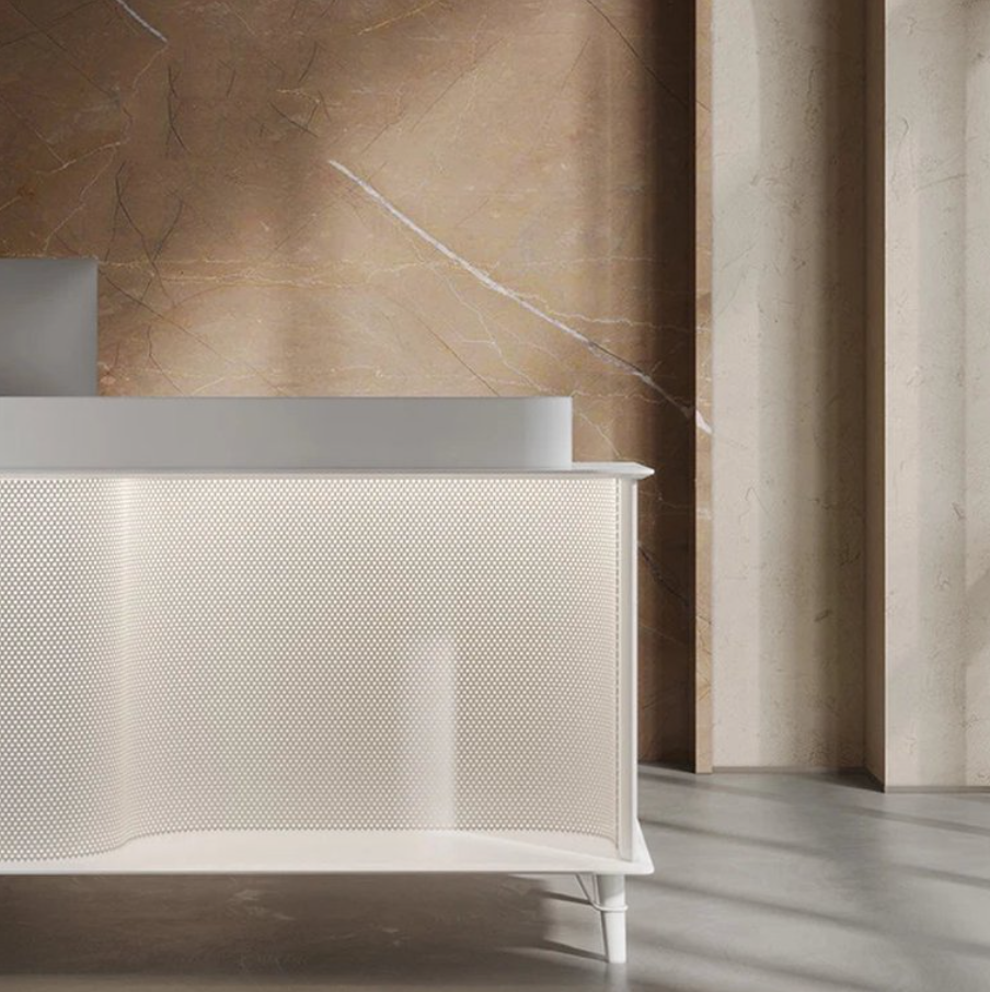 ミニマルデザインの受付カウンター | 穏やかな石の装飾