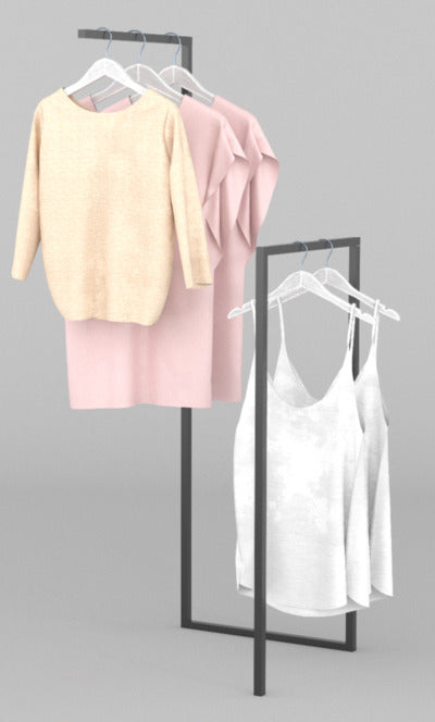 ブラックフレームのハンガーラックに淡色トップスを掛けたスタイリッシュな展示イメージ