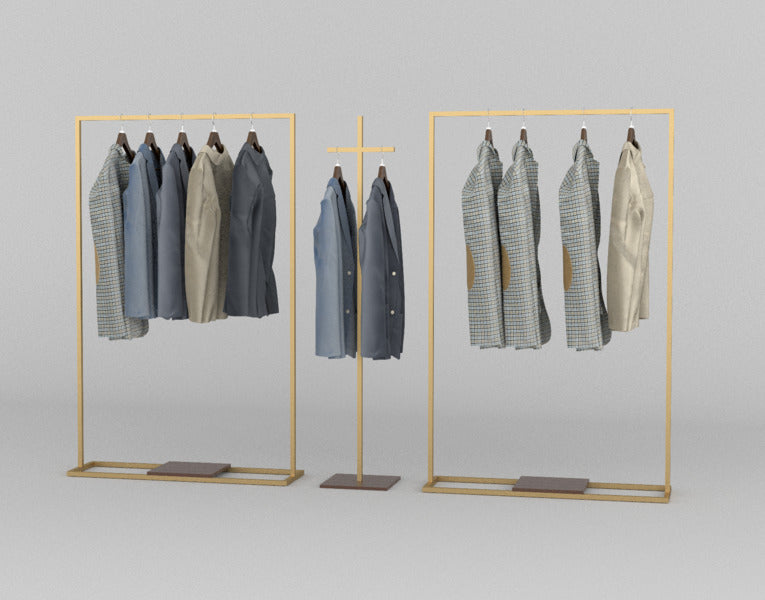 ゴールドフレームのハンガーラックセットにコートを掛けたミニマルなディスプレイ