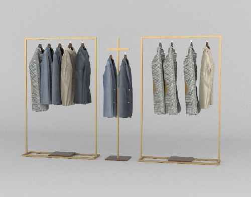 ゴールドフレームのハンガーラックとクロスバーラックにジャケットを掛けたエレガントな展示ディスプレイ