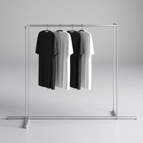 シルバーフレームのハンガーラックにモノトーンTシャツを掛けたクリーンな展示画像